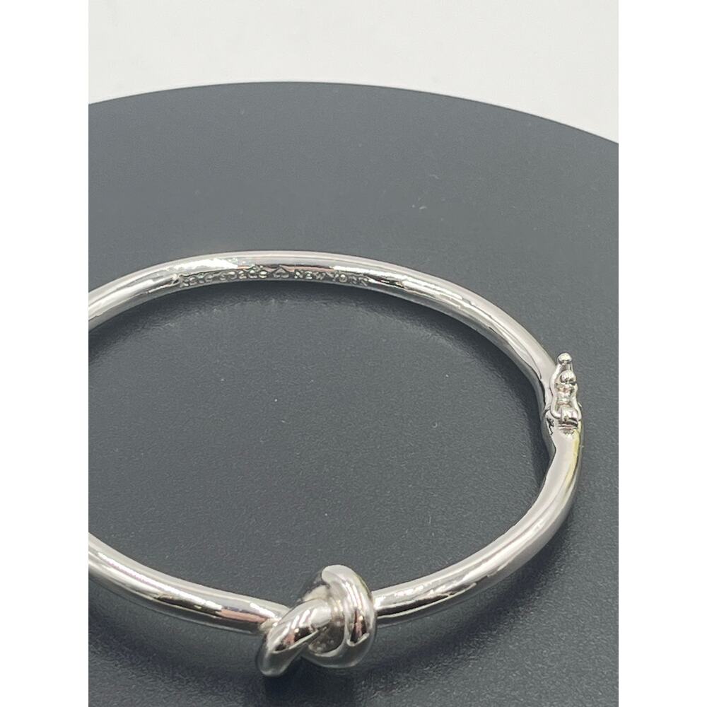 Kate Spade Sailor's Knot Love Knot‎ Polished Silver Tone Hinged Bangle Bracelet - Picture 3 of 9
